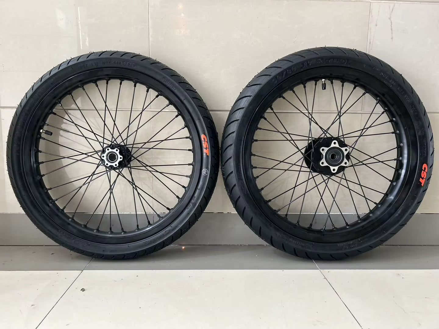 Surron LBX supermoto wheel set.